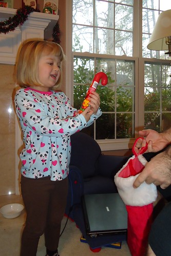 Catie checking out her stocking on Christmas morning