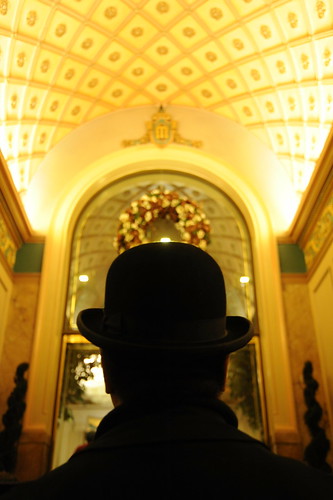 Man in the bowler hat, entrance, Mayflower Park Hotel, celebrating 84 years, Seattle, Washington, USA by Wonderlane
