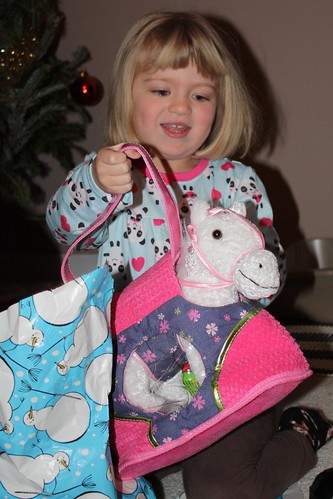 "It's a white horsey in a purse!!!!"