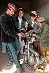 Young Afghan Civilians on a Motorcycle Repair Training Programme by Defence Images