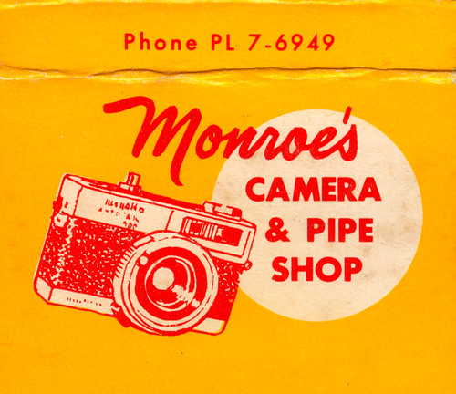 Monroe's Camera & Pipe Shop by jericl cat