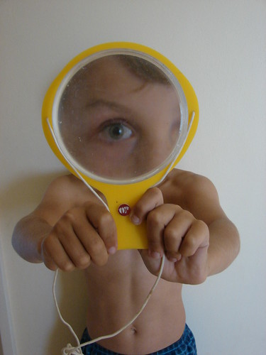 Boy with Yellow Magnifying Glass by barbourians