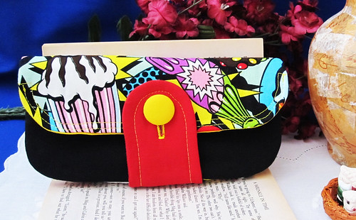 Foldover Clutch with a front pocket and button closure