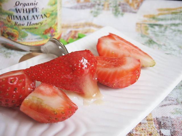 White raw honey strawberries