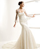 Wedding gown with bolero and lace around the dress
