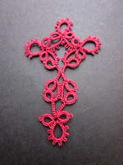 tatted red konior cross