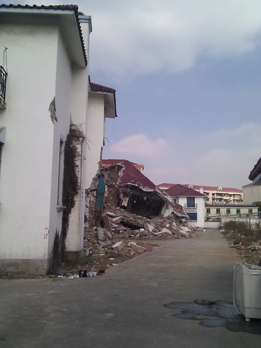 Also villa compounds get demolished in Shanghai to make way for new buildings