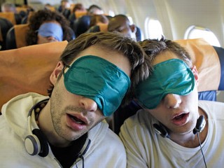 two-guys-sleeping-airplane-masks