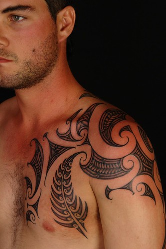 maori shoulder tattoo. Maori Shoulder Fern Tattoo 1
