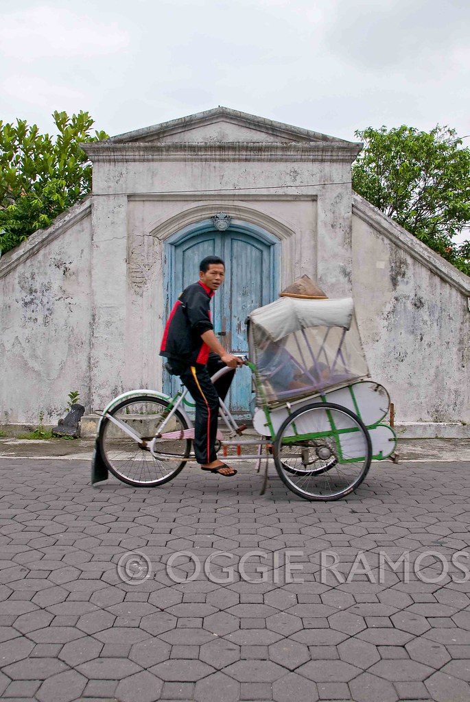 Indonesia - Solo Kraton Becak Against Blue Door