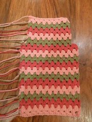 Crocheted hot water bottle cover
