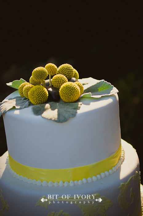 yellow and gray floral wedding cake