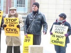 Anti-War Committee organizer Mick Kelly speaks outside the federal building on litigation involving attacks against activists during the 2008 Republican National Convention. Kelly's home was raided by the FBI in Sept. by Pan-African News Wire File Photos
