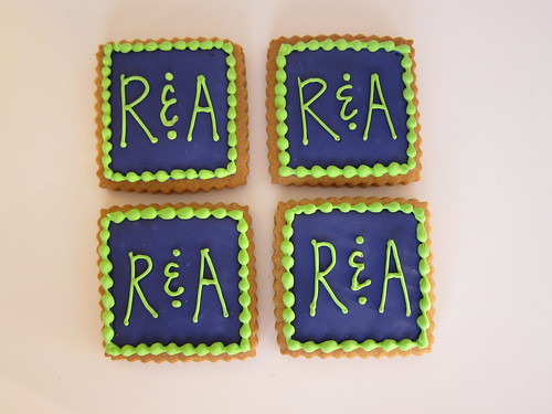 Bridal shower cookies in their wedding theme color scheme purple and lime 