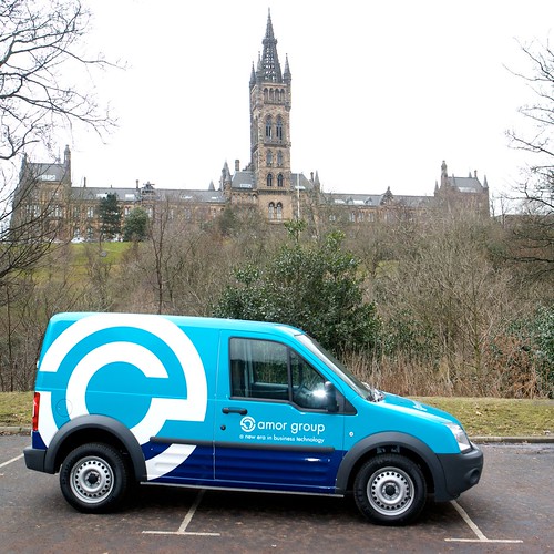 amor group. One of the Amor Group vans with the University of Glasgow in the background.