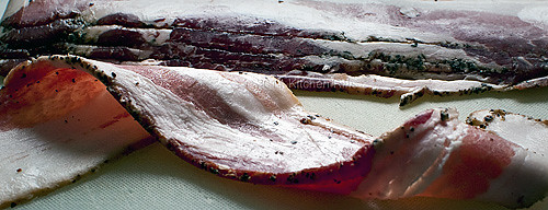 slice of raw bacon