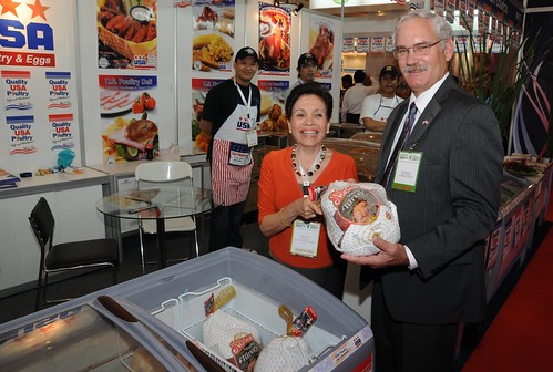 Acting Under Secretary for Farm and Foreign Agricultural Services, Michael Scuse, meets with Magaret Say of the USA Poultry Export Council's Singapore office at the 11th Food and Hotel Indonesia show in Jakarta April 6. As part of the U.S. Agribusiness Trade and Investment Mission to Indonesia this month, Scuse helped open the show, toured the floor and met with U.S. exhibitors. (Photographer, Rifky Suryadinata, U.S. Embassy, Jakarta)