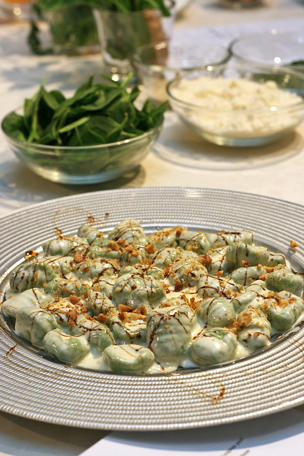 Homemade Spinach and Potato Dumpling with a Gorgonzola Cheese Sauce, Toasted Walnuts and a Balsamico Glaze