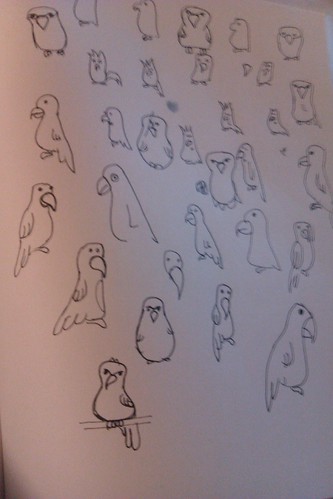 a page full of line drawings of parrots