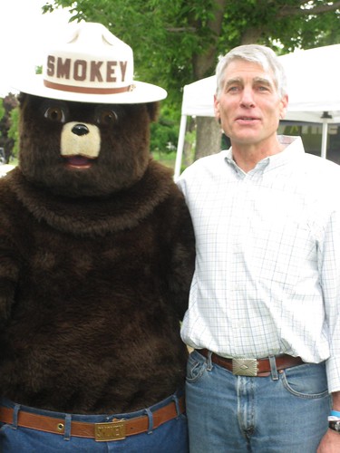Mark Udall poses with Smokey Bear on National Get Outdoors Day