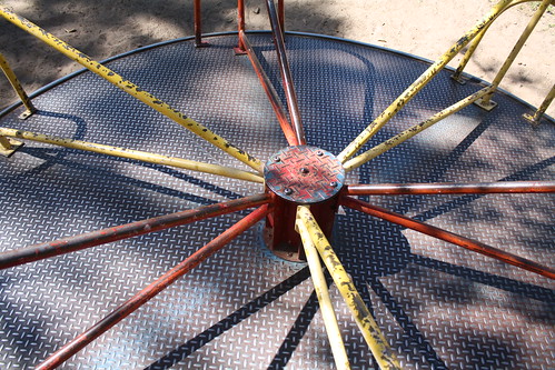 Metal merry go-round