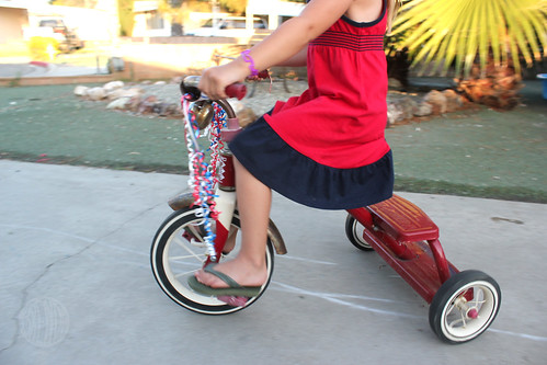 Tricycle with patriotic streamers 