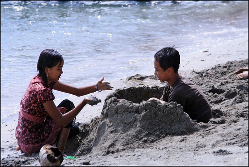 Playing Sand at Pasir Putih Beach