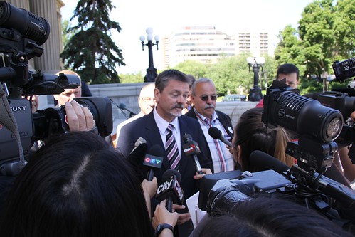 A photo of PC leadership candidate Doug Horner in a media scrum