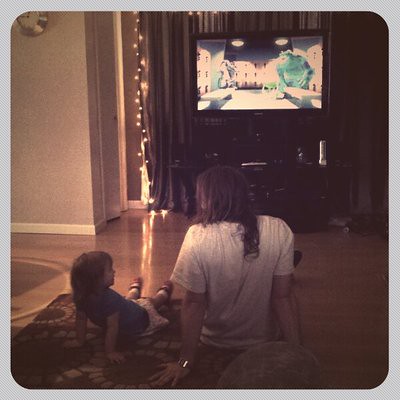 Cousin David and Ora watching Monsters inc.