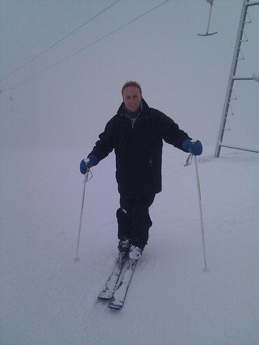 Skiing in the fog in Sauerland, the top of the mountain is in the clouds