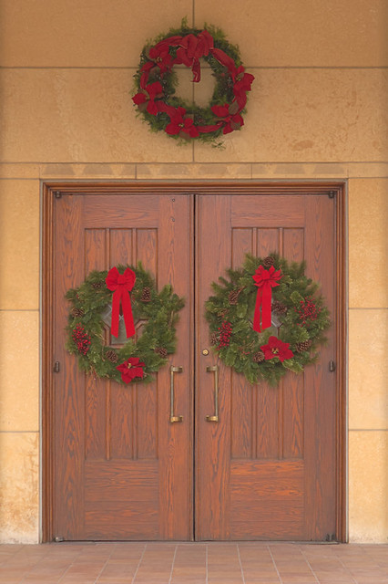Saint Gabriel the Archangel Roman Catholic Church, in Saint Louis, Missouri, USA - door with Christmas wreathes