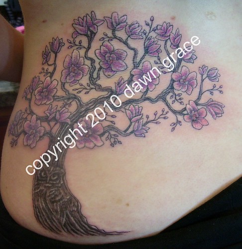 magnolia tree tattoo. Magnolia tree with owl trunk