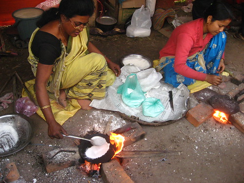 Making pithas for Bhogali Bihu
