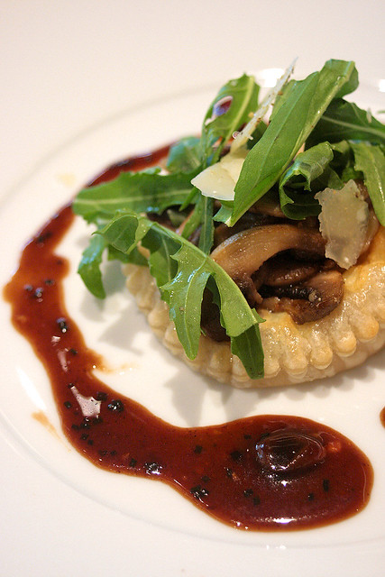 Wild Mushroom Tart with Rucola and Shaved Parmesan