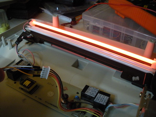 Power to light red cold cathode tube