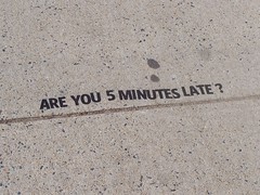 Are you 5 minutes late? -- vinyl letter installation, St. Paul Street, near Penn Station, Baltimore