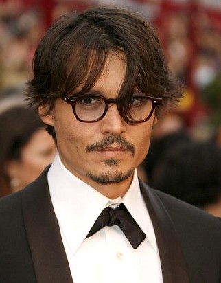 Johny Depp always has his own sense of fashion by matching it with white 
