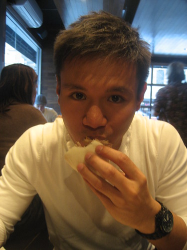 Me eating the Pork Buns at Momofuku.