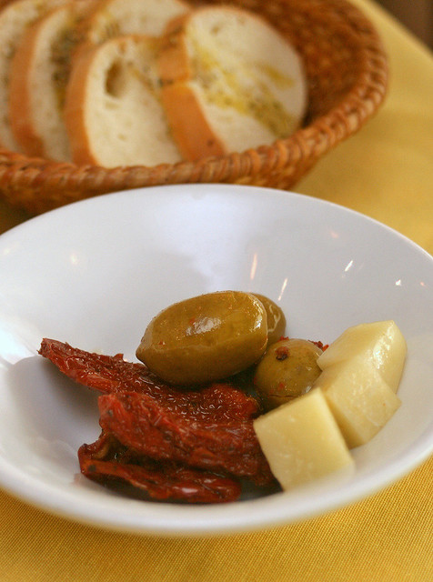 Welcome basket of bread includes olives, sundried tomatoes and cheese!