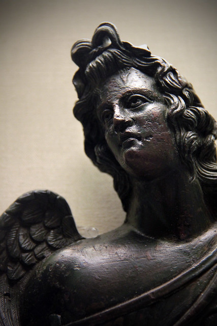 Bronze bust of a winged youth wearing ivy crown, Roman 2c AD