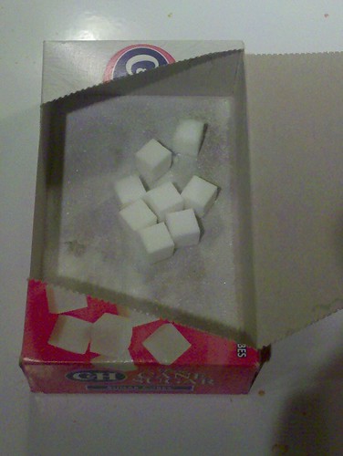 8 sugar cubes in a box