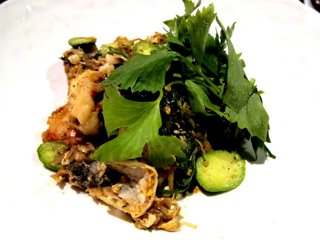 Pad gung sai sator gratiam dong lae cha-om (Stir-fried prawn with sator bean pickled garlic and acacia leaves)