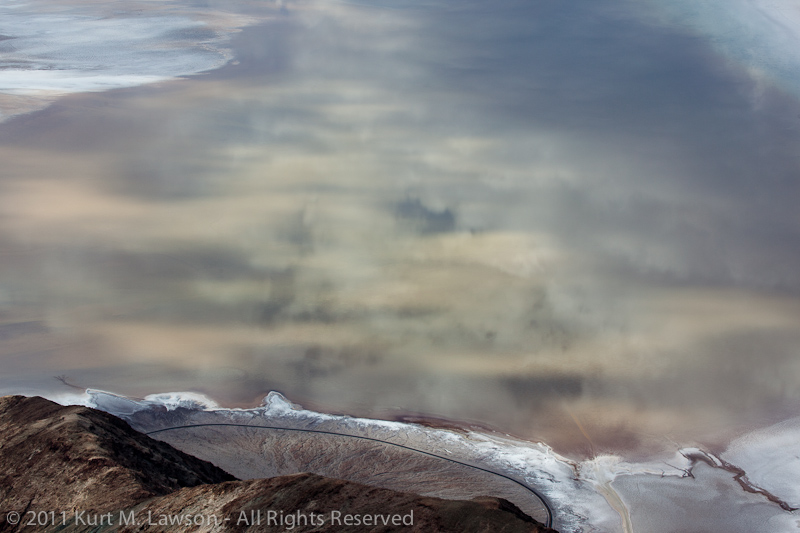 Cloud reflections in a flooded Badwater