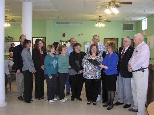 Missouri State Director Janie Dunning (Third from Right)  presents a plaque recognizing the community accomplishments of the nutrition center. Others in attendance include Board Members; staff members representing Senator Claire McCaskill  and Congressman Blaine Luetkemeyer, Regional Planning Commission member and Rural Development staff.