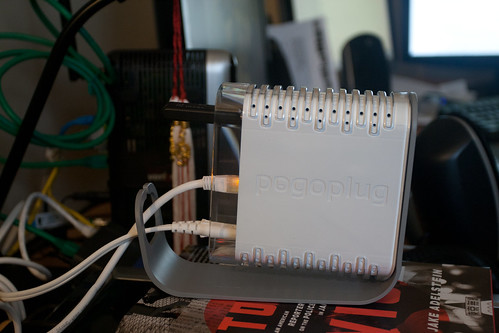 Pogoplug from the side with usb stick and cables