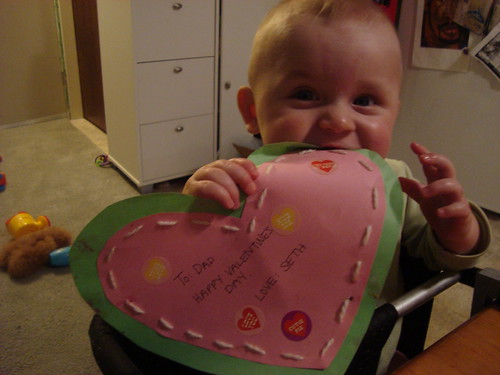 seth putting the finishing touches on his dad's valentine.