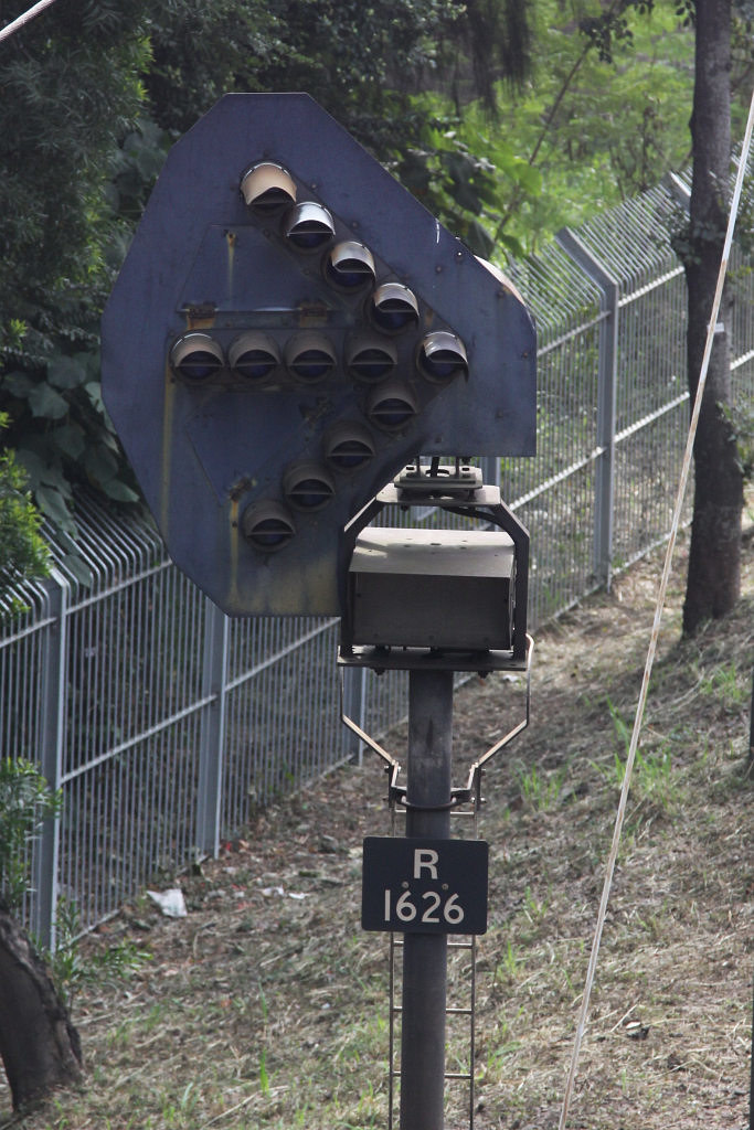 Repeater signal R1626 south of University station, before the junction for the Racecourse