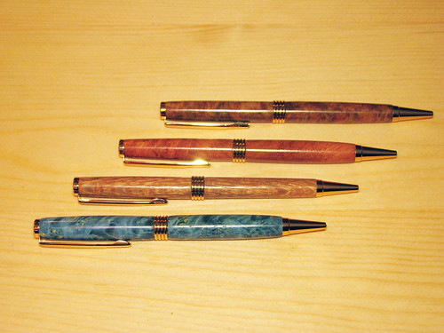 Four 'Steamline' Twist Pens