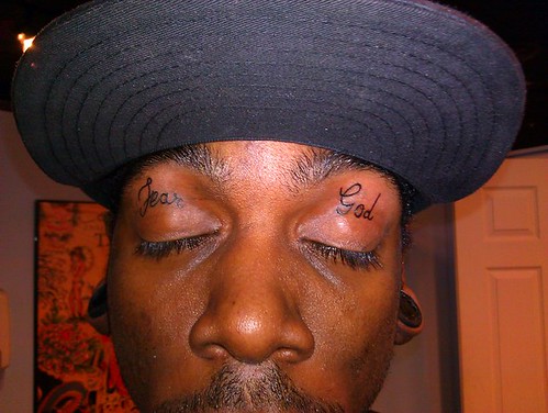 tattoos on eyelids. quot;fear godquot; eyelid tattoo by