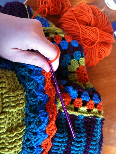 Working on the Border of Crochet Sampler